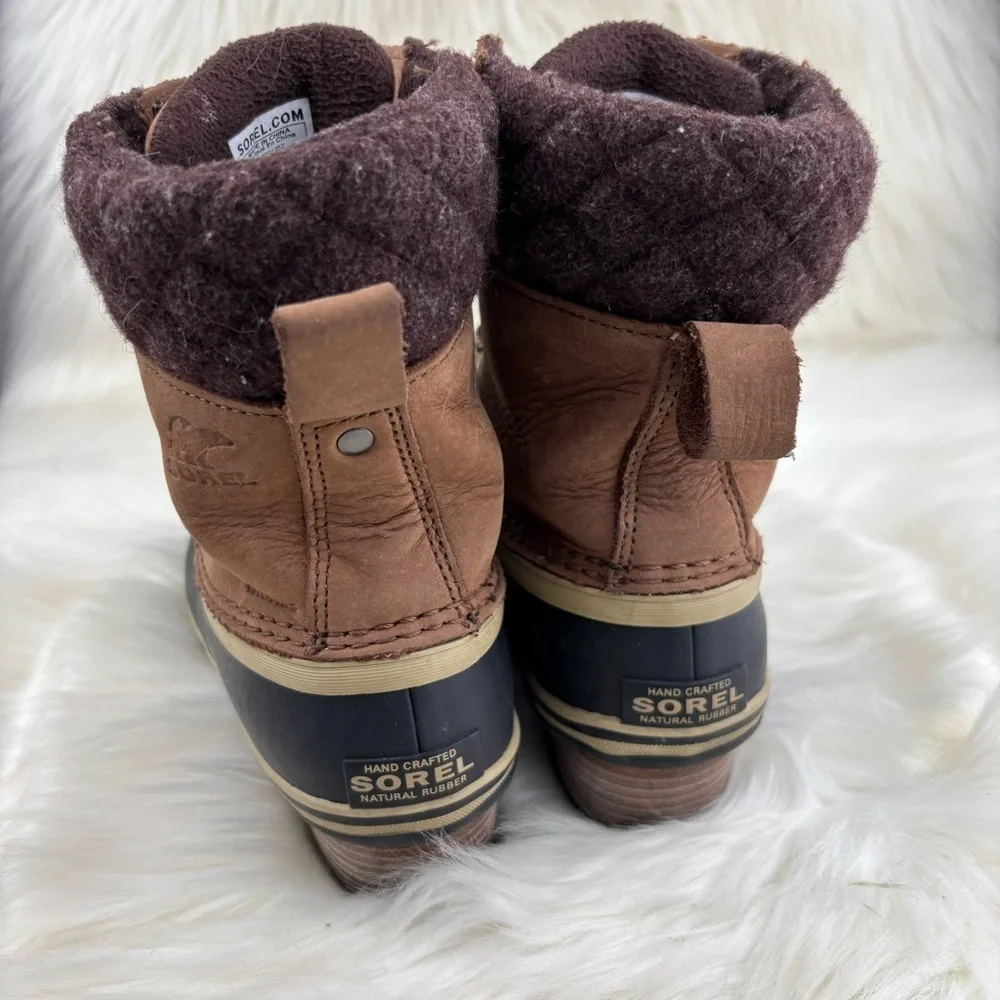 Sorel Tan and Black Lace-Up Boots